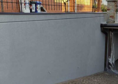 Rivestimento sughero a spruzzo per rampa garage interrato